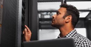 IT technician checking server